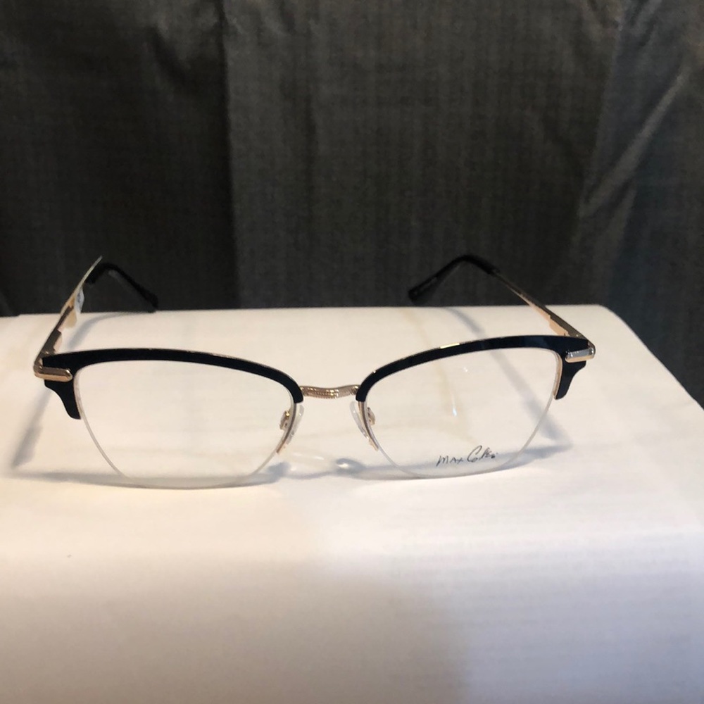 Max Cole black and gold eyeglasses frames.